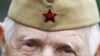 FILE - A World War II veteran looks on during a Victory Day celebration in Gorky Park in Moscow, May 9, 2012. 
