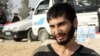 Yazan Abdulrahman Mohammad Ali, 20, escaped from Raqqa less than two weeks ago and was detained for ten days before being freed. But his family is dead, and his home is destroyed on Oct. 25, 2017 in Ain Issa, Syria. (H.Murdock/VOA)
