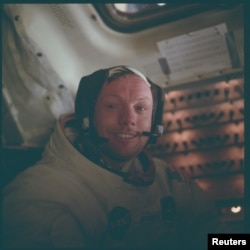 Astronaut Neil A. Armstrong, Apollo 11 commander, is pictured inside the Lunar Module while it rested on the lunar surface during the Apollo 11 mission, July 20, 1969, NASA handout photo.