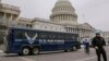 An Air Force bus waits on the Capitol plaza after President Donald Trump used his executive power to deny military aircraft to House Speaker Nancy Pelosi just before she was depart to visit troops abroad, on Capitol Hill in Washington, Jan. 17, 2019.