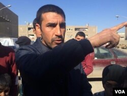 Former local police officer Fowas tells his story near his home in Mosul, Iraq on Feb. 8, 2017. In areas still controlled by IS, he and scores of other residents say, former local police are rounded up as Iraqi forces approach. Many are killed. (H.Murdock/VOA)