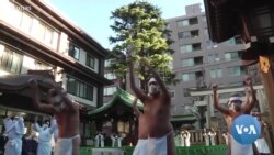 In Japan, Worshippers Take Frosty Plunge Against COVID-19 