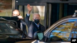 President Joe Biden arrives at Walter Reed National Military Medical Center for a physical exam, Nov. 19, 2021, in Bethesda, Md. 
