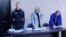Jailed Russian opposition leader Alexei Navalny attends a court hearing in Pokrov