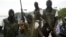Members of Movement for the Emancipation for the Niger Delta, (MEND) a militant group patrol the creeks in the Niger Delta area of Nigeria