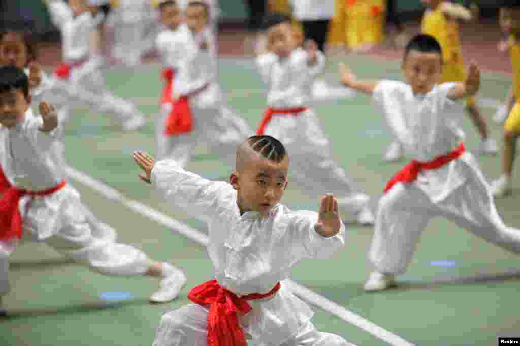 Children take part in a children's martial arts competition in Xi'an, Shaanxi province, China Ju.