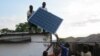 Solar collector panel is installed on roof in rural Phalombe district of Malawi. (VOA/Lameck Masina) 