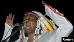 Congolese rumba music legend Papa Wemba gives his first concert in Kinshasa, June 26, 2004.