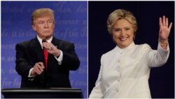 Democratic presidential nominee Hillary Clinton and Republican presidential nominee Donald Trump begin their third presidential debate at UNLV in Las Vegas, Oct. 19, 2016.