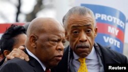 Congressman John Lewis and Rev. Al Sharpton at a voter rights rally at the US Supreme Court in Washington, Feb. 27, 2013.