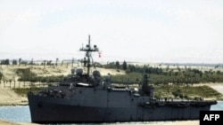 Surfers ride waves at Shonan beach in Fujisawa city, west of Tokyo, Japan. Heat wave continues through out Japan as temperature sores to 35 degrees Celsius (95 degrees Fahrenheit) in the Tokyo metropolitan area, according to the Meteorological bureau.