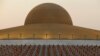 Thai Buddhist monks pray and gather at Wat Dhammakaya temple in Pathum Thani, Thailand, Feb. 22, 2016.