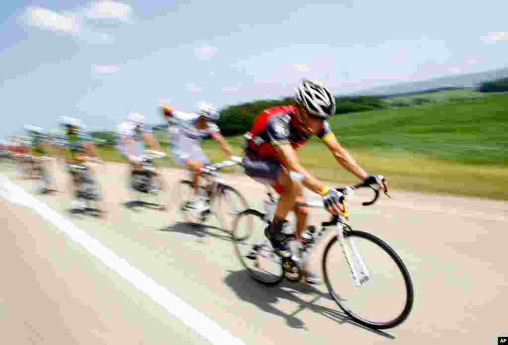 July 10, 2010: Lance Armstrong rides in the pack during his final Tour de France.