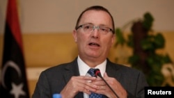 Gaanfa Afrikaatiif jila addaa Yunaayitid  Isteetis, Jefrii Feltmaan (Suuraa faayilii)