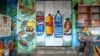 FILE - A mural on the exterior wall of a store illustrates food and drinks in a commercial district of Mogadishu, Somalia, June 8, 2017.
