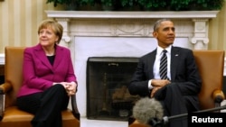 Presiden AS Barack Obama dan Kanselir Jerman Angela Merkel membahas krisis di Ukraina timur dalam pertemuan di Gedung Putih, Senin (9/2).