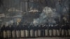 Riot police officers take position outside Kyiv's Independence Square, the epicenter of the country's current unrest, Ukraine, Feb. 1, 2014.