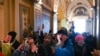 FILE - Supporters of U.S. President Donald Trump protest inside the U.S. Capitol, Jan. 6, 2021.