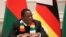 FILE - Zimbabwe's President Emmerson Mnangagwa speaks in Minsk, Belarus, Jan. 17, 2019. 