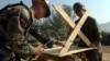 U.S Navy Mobile Construction Battalion 74 from Gulfport, Missisisippi made a table in Muzaffarabad, Pakistan, Monday, Oct 31, 2005. (AP Photo/ Achmad Ibrahim)