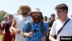 Britain's Russ Cook becomes the first person to run the entire length of Africa