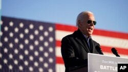 Democratic presidential candidate Joe Biden speaks during a campaign rally at the Minnesota State Fairgrounds in St. Paul, Minn., Oct. 30, 2020.