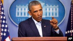 Predsednik Obama tokom konferencije za novinare u Beloj kući 18. avgusta 2014.