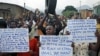 Protesters march who are against Burundi President Pierre Nkurunziza and his bid for a third term, in Bujumbura, Burundi, June 4, 2015.
