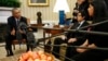 FILE - US President Barack Obama meets with a group of "dreamers" who have received Deferred Action for Childhood Arrivals (DACA) at the White House in Washington, Feb. 4, 2015.