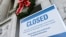 A sign is displayed at the National Archives building that is closed because of a U.S. government shutdown in Washington, Dec. 22, 2018.
