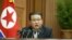 North Korean leader Kim Jong Un delivers a speech at the 5th Session of the 14th Supreme People's Assembly of the Democratic People's Republic of Korea in Pyongyang, North Korea, in this undated photo released Sept. 30, 2021 by North Korea's Korean Centr