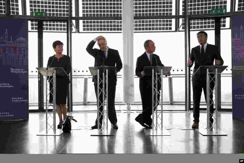 From right, Florence Mayor Matteo Renzi, New York Mayor Michael Bloomberg, London Mayor Boris Johnson, and Warsaw Mayor Hanna Gronkiewicz-Waltz, during the Mayors Challenge competition, at City Hall in London.