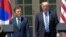 President Donald Trump and South Korean President Moon Jae-in arrive in the Rose Garden of the White House in Washington, June 30, 2017, to make statements.
