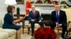 FILE - Vice President Mike Pence, center, looks on as House Minority Leader, now House Speaker, Rep. Nancy Pelosi, and President Donald Trump argue during a meeting in the Oval Office of the White House, Dec. 11, 2018, in Washington.
