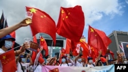 حامیان چین تصویب قانون جدید برای هانگ کانگ را تجلیل کردند