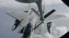 지난 2005년 4월 동중국해에서 일본 항공자위대 소속 F-15 전투기가 미 공군 KC-135R 공중급유기와 공중급유훈련을 실시했다.