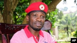 FILE - Pop star-turned-opposition lawmaker Bobi Wine, whose real name is Kyagulanyi Ssentamu, is seen while giving an interview to Associated Press at his home, Magere in Kampala, Uganda, July 15, 2019. 