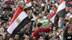 Morsi supporters rally in Cairo ahead of Saturday's referendum on a new constitution, Dec. 14, 2012.
