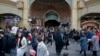 FILE - People walk around the Grand Bazaar in Tehran, Iran, Feb. 7, 2019.