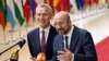 President of the European Council Charles Michel (R) talks to the media as he arrives with NATO Secretary General Jens Stoltenberg (L) for a European Council Summit, at the EU headquarters in Brussels, on June 29, 2023.