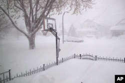 Heavy snow covers the street in Buffalo, New York, Nov. 18, 2014.