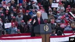 President Donald Trump speaks at a campaign rally at Manchester-Boston Regional Airport, Sunday, Oct. 25, 2020, in Londonderry, N.H. (AP Photo/Alex Brandon)