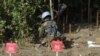 FILE- A Cambodian expert works to take out a land mine in Pailin province, a former Khmer Rouge stronghold in northwestern Cambodia.