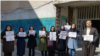 Iranian teachers join a nationwide teachers’ strike in the northwestern city of Marivan, March 4, 2019. They held protest signs calling for the release of detained teachers’ rights activists and for better working conditions. (Photo courtesy of CCTSI)