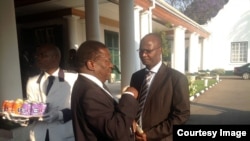 FILE: Vice President and Justice Minister Emmerson Mnangagwa and Higher Education Minister Jonathan Moyo.