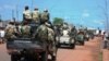 Central African troops in charge of disarmament drive a tank through Bangui, Central African Republic, Sept. 5, 2013.