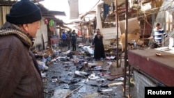 지난 25일 이라크 바그다드의 한 시장에서 벌어진 폭탄 테러 현장. (자료사진)