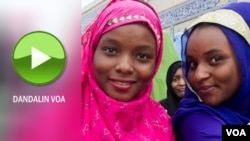 Flowers are placed on names of the victims at the National 9/11 Memorial and Museum during ceremonies marking the 16th anniversary of the attacks in New York.