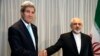 U.S. Secretary of State John Kerry shakes hands with Iranian Foreign Minister Mohammad Javad Zarif before a meeting in Geneva, Jan. 14, 2015. 