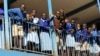Students are seen outside their classrooms on the second week of a national teachers' strike, at Olympic Primary School in Kenya's capital Nairobi, September 9, 2015.